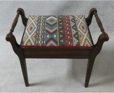 A late 19th century mahogany piano stool on square tapering supports. H.51XL.58XW.35 