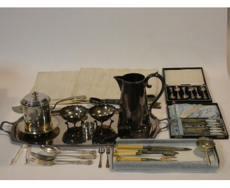 A collection of silver and silver plated items. Including a set of Elizabeth II Coronation teaspoons, a pair of Mappin and We