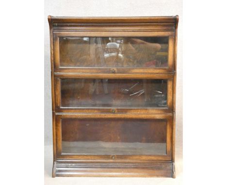 A vintage oak three section Globe Wernicke style bookcase. H.113 W.87 D.31cm 