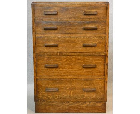 A vintage oak chest of drawers on plinth base. H.93 W.61 D.45cm 