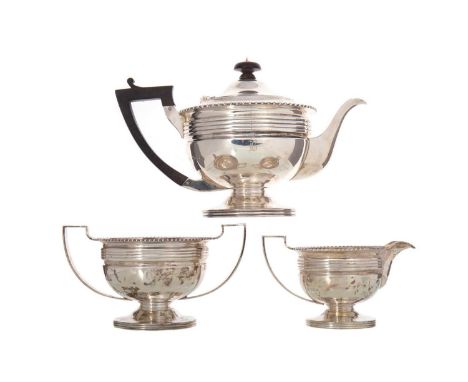 GEORGE V SILVER THREE PIECE TEA SERVICE MARTIN HALL &amp; CO., SHEFFIELD 1916 comprising teapot, sugar bowl and cream jug, ea