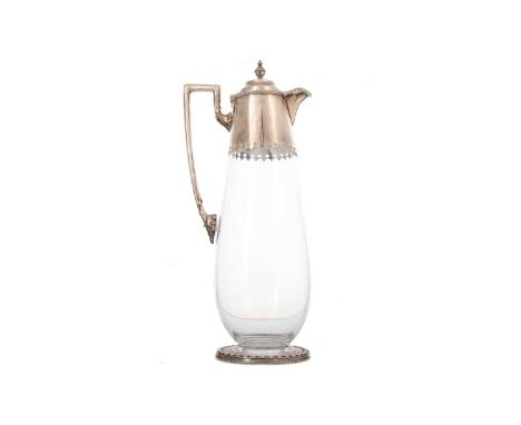 VICTORIAN SILVER MOUNTED CLEAR GLASS CLARET JUG WILLIAM HUTTON &amp; SONS, LONDON 1885 the hinged cover with orb to spike fin