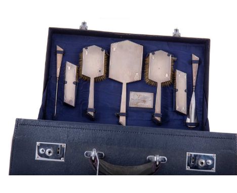 GEORGE VI ART DECO SILVER MOUNTED TRAVELLING VANITY SET WALKER &amp; HALL comprising of a mirror, pairs of hair and clothes b