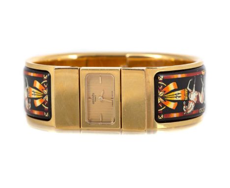 HERMES, LADY'S GILT METAL QUARTZ WRISTWATCH the signed square dial set with gilt markers at 3, 6, 9 and 12, stamped L01.201 a