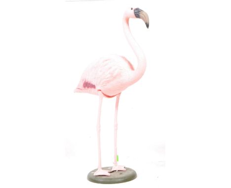 Sport-Plast - A vintage 20th century Italian flamingo decorative garden figure. The figure stood upon a rounded green moulded
