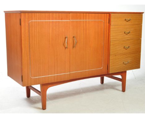 British Modern Design - A vintage mid 20th century teak veneered sideboard credenza. The sideboard raised on tapered supports