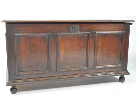 19th century Victorian oak coffer blanket box. Features panelling to facade and raised on four short bun feet. Lid opening to