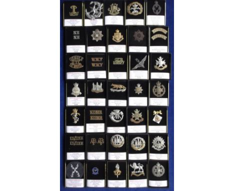 Military, a collection of approx 35 Military cap badges and shoulder titles etc inc. WW1 Red Cross shoulder titles (pair), No