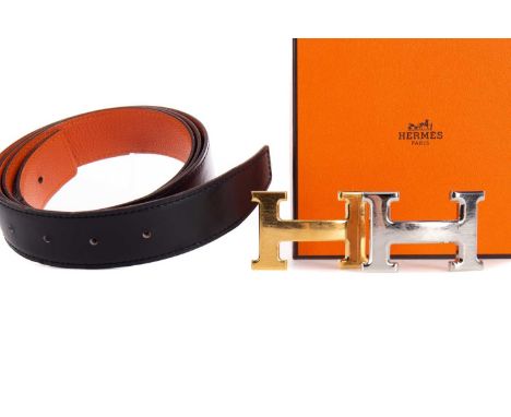 HERMES LEATHER BELT WITH TWO 'H' BUCKLES,the belt in leather with orange/tan reverse, the buckles gold and silver toned respe