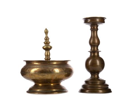 DUTCH TOBACCO JAR,the circular lid with a raised finial, 23cm diameter, along with a pricket candlestick, 32cm high (2)