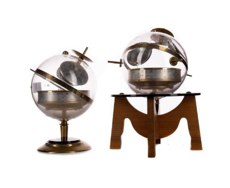 TWO 1960S WEST GEMAN HUGER 'SPUTNIK' TABLETOP WEATHER STATIONS,each perspex globe containing temperature, barometer and relat