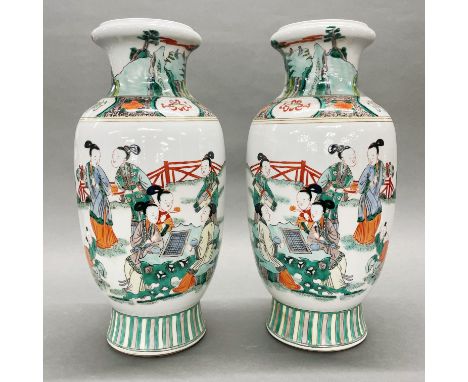 A pair of Chinese hand enamelled porcelain vases, H. 43cm.