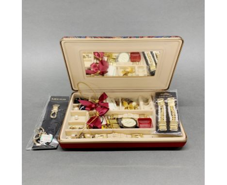 A jewellery box and costume jewellery contents.