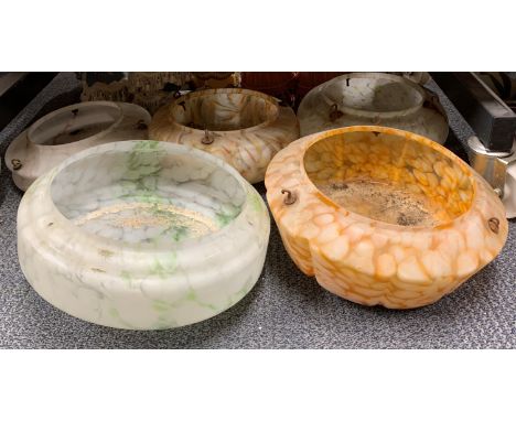 A group of five 1930's marbled glass ceiling light shades, dia. 36cm.