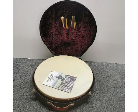 A cased Hobgoblin music drum, dia. 46cm.