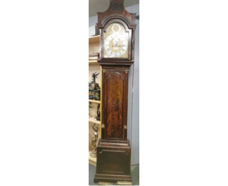 A late 28thC carved mahogany longcase clock with flame mahogany decoration to door, overall H. 234cm W. 46cm D. 24cm. A/F to 