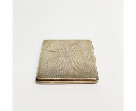 A hallmarked silver cigarette case, size 10 x 8cm, approx. 135gr.&nbsp;