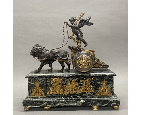 An impressive large 19thC gilt bronze and marble mantel clock, W. 43cm H. 44cm.