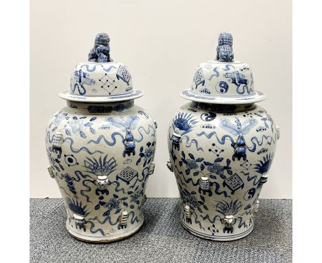 A pair of large Chinese hand painted provincial porcelain jars and lids, H. 62cm.