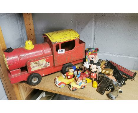 A group of mixed vintage toys.