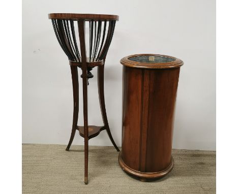 An early 20thC inlaid mahogany basket jardiniere stand, H. 89cm with a mahogany umbrella/ stick stand with metal liner, H. 68