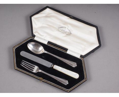 A silver fork and spoon and similar knife, in fitted case, and a set of six silver handled fruit forks, in fitted case 