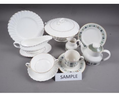 A Royal Doulton gilt bordered part dinner service and a Royal Doulton "Tapestry" pattern part teaset 