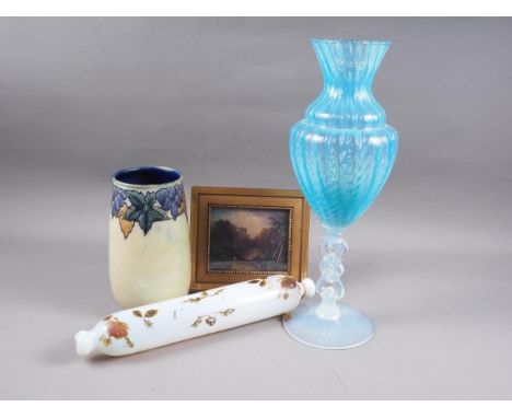 A Royal Doulton Lambeth vase, decorated vine leaves and grapes, 8" high, a moulded blue glass pedestal vase, 15" high, a milk