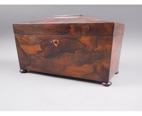 A rosewood sarcophagus two-section tea caddy with glass mixing bowl, on bun feet, 12 1/2" wide 