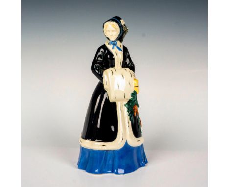 Lovely allegorical figurine from the Vienna Secessionist Movement for the Austrian Wiener Werkstatte Factory. She wears a dar