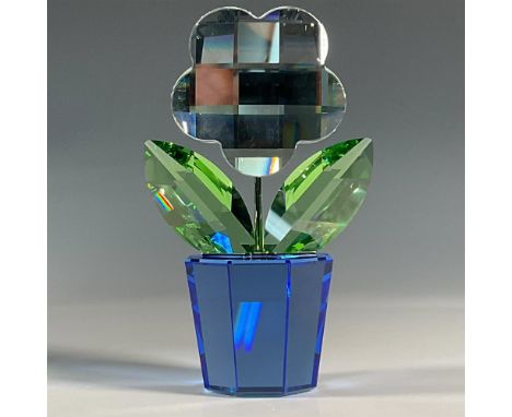 A large, heavyweight lead crystal flower that was part of the Happy Flowers collection. Features blue pot, green leaves, clea