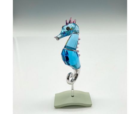 Part of the Exotic Fish and South Sea collection. This lovely figural is made of aquamarine crystal with lavender crystal dor