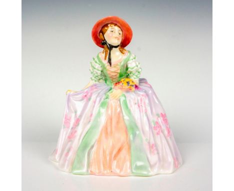 Rare; Glazed porcelain figurine; light colored dress with green accents, pink hat; holding flowers. Handwritten title and HN 