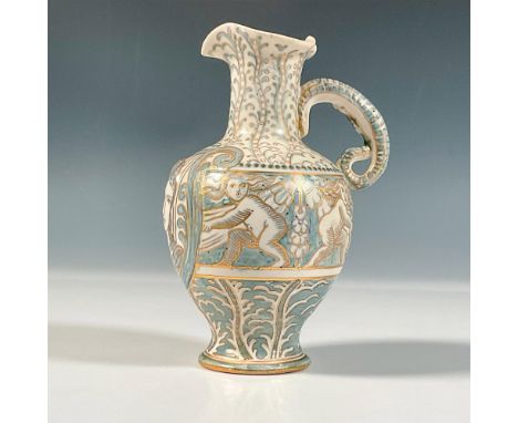 A beautiful white matte glaze stoneware depicting a maiden in a lyre frame surrounded by putti. Blue pigment brush-line and d