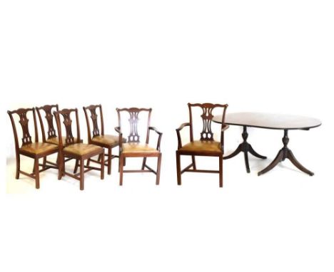 Set of six mahogany Chippendale style chairs (4 + 2 arm) together with a reproduction twin-pillar D-end dining table with sin