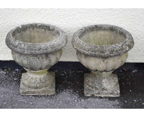 Pair of 'Sandford Stone 'composite garden urns, both 30cm x 34cm