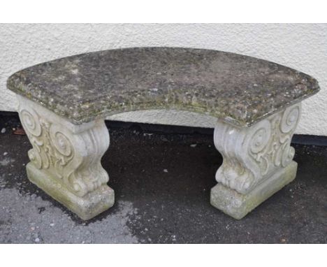 Composite stone curved garden seat having decorative supports, 98cm x 46cm high