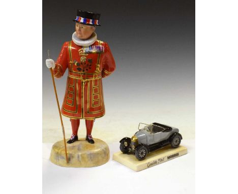 Royal Crown Derby Beefeater figure, and a Carltonware Morris car advertising model, (2)