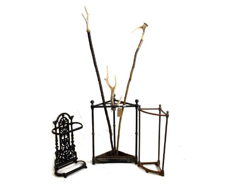 Three stick stands, largest 42cm x 61cm, together with two stag horn grip sticks etc 