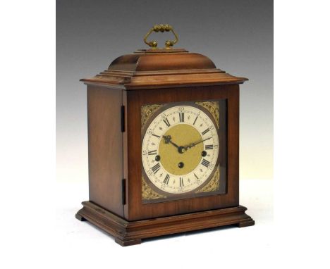 German walnut-cased bracket or mantel clock with silvered Roman dial and matted centre, three-train movement chiming on gong 