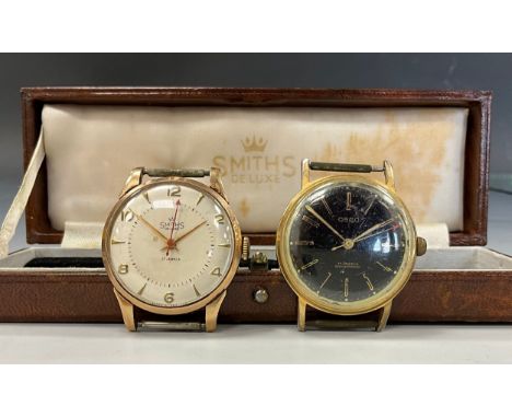 A Smiths De Luxe 9ct gold cased watch head, two tone grey and cream dial, Arabic numerals and arrow baton markers, red arrow 