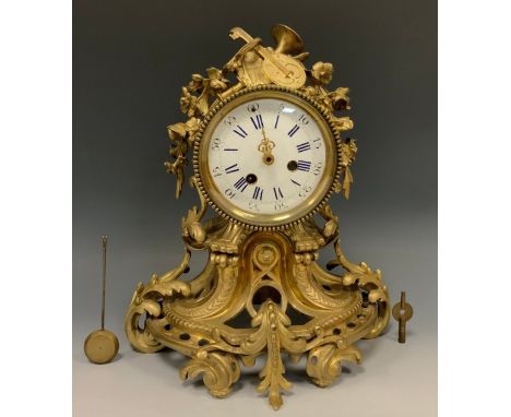 A 19th century French ormolu mantel clock, 10.5cm convex enamel dial inscribed with Roman and subsidiary Arabic numerals, twi
