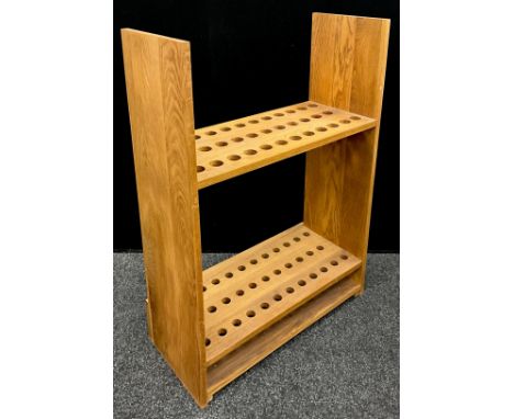 An oak walking stick collector’s / rabologist’s stand, with 35 stick capacity, 91.5cm high x 65.5cm wide x 27cm deep. 