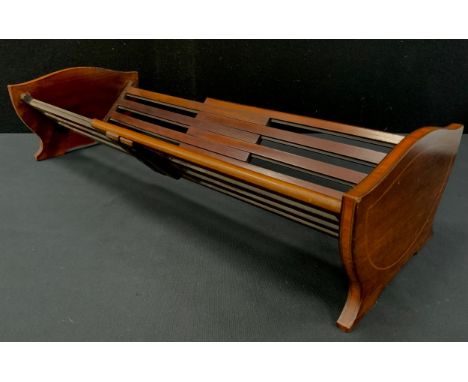 A Edwardian inlaid mahogany telescopic book trough, 56cm wide extended, 36.5cm closed 
