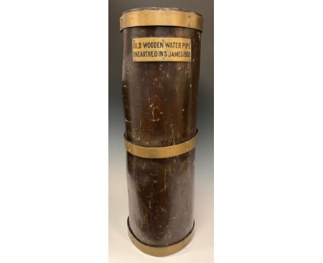 London History - a brass mounted section of post-medieval water pipe, applied with a plaque inscribed Old Wooden Water Pipe U