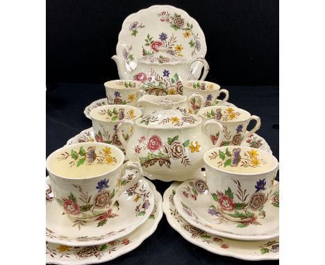 A Palissy ‘Sheridan’ tea service for six including; a picnic plate, a tea pot, six tea cups and saucers, side plates; etc 