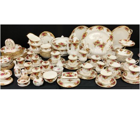 Royal Albert ‘Old Country roses’ pattern part table service for four including; tea pot, coffee pot, milk jug, sugar pot, nin