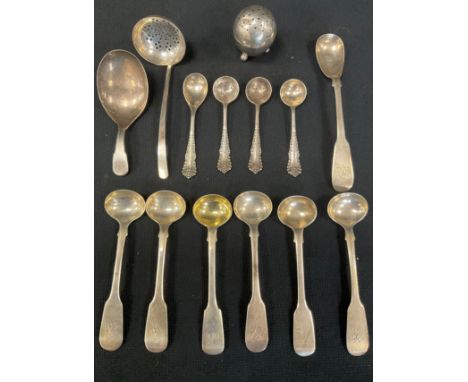 A George III silver caddy spoon, London 1802, set of four mustard spoons, straining ladle etc , 4.45 ozt 