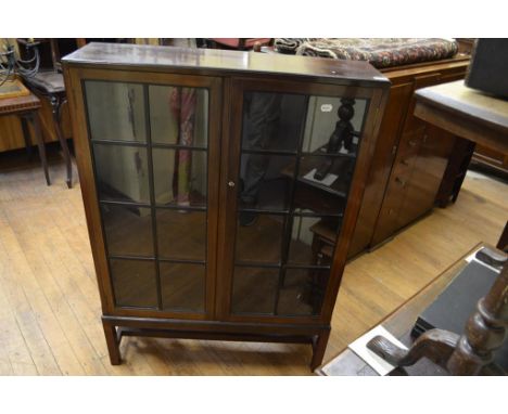 A Heals mahogany glazed bookcase, on square legs, 92.5 cm wide   Condition report  Report by GHTop scratched and ring marked.