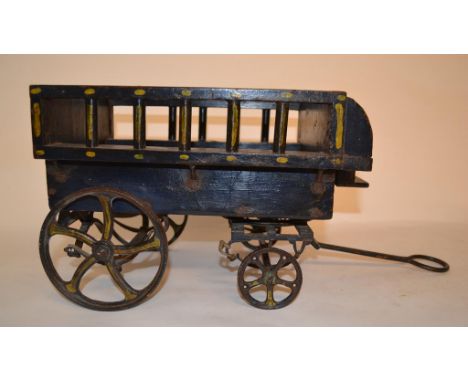 An Edwardian painted wood and metal model hand cart, 19 cm wide   Condition report  Report by GHGenerally in good condition w